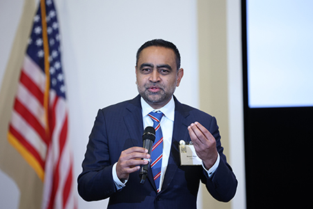 Nirav Patel, MD, presenting at the symposium