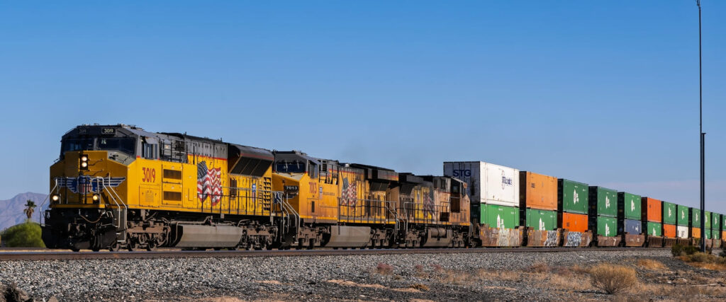 Intermodal drayage trucks move containers between rail yards and ports.