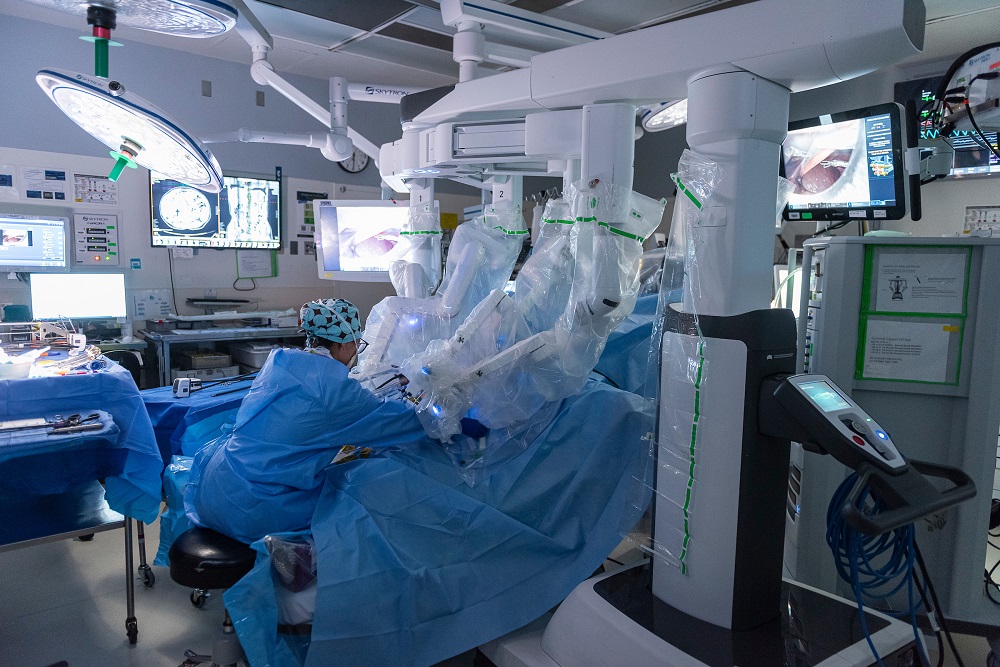 Dr. Clancy using the minimally invasive surgical robot.