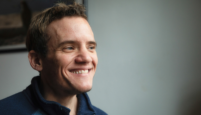 transgender man smiling