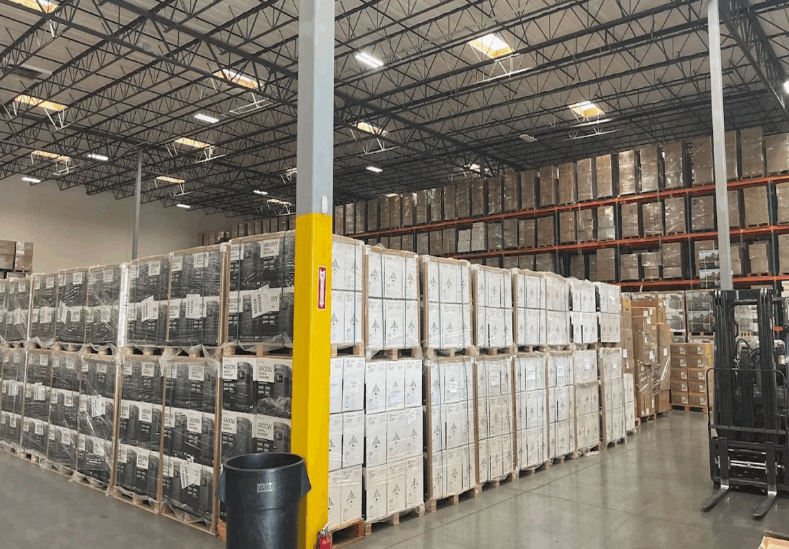Lean warehousing layout showing organized shelves and efficient warehouse workflow